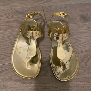 Michael Kory Gold jelly sandals